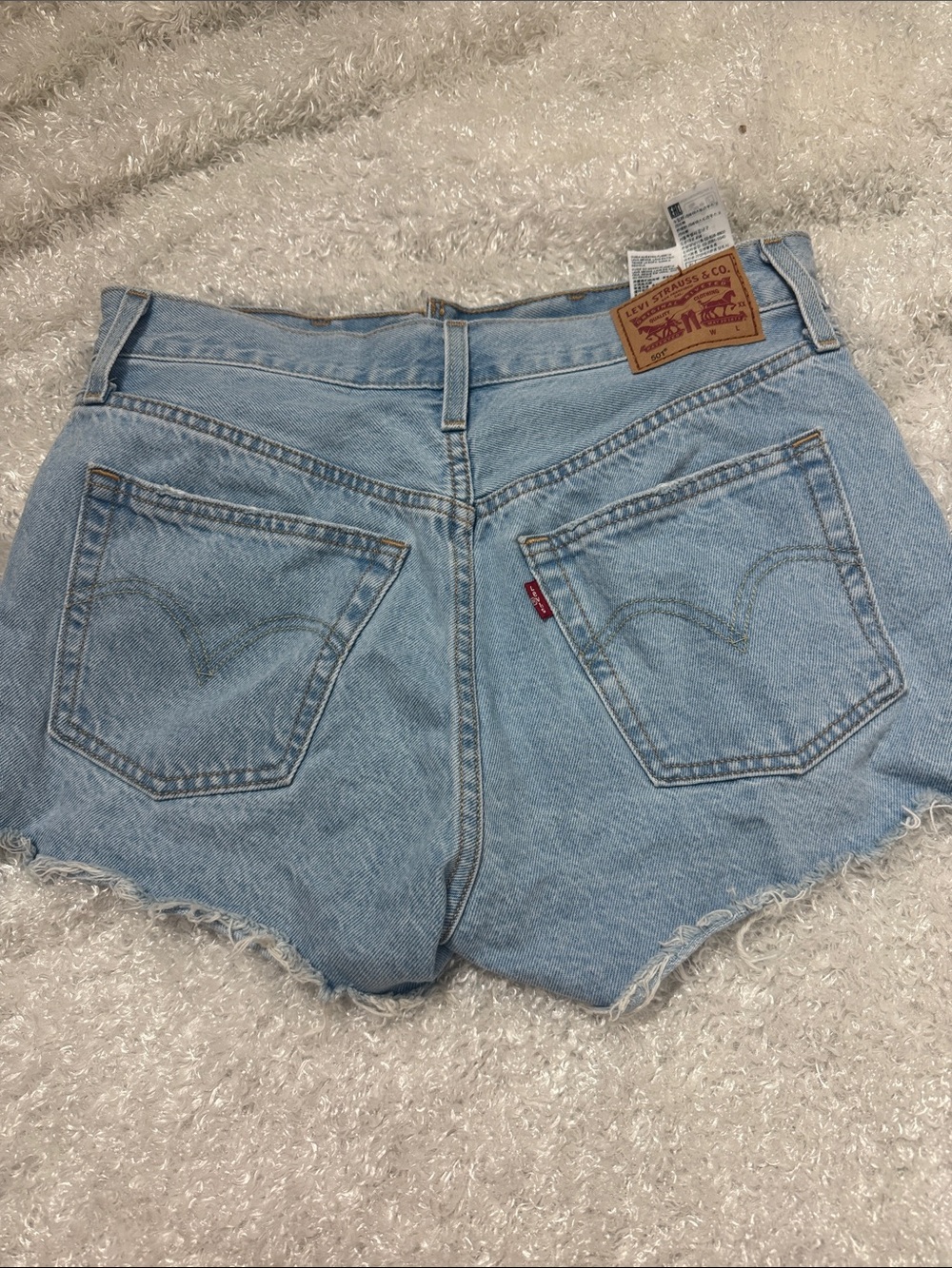 Levi’s 501 light wash denim cut off shorts women’s 27